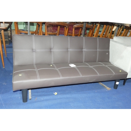 436 - A brown upholstered click clack type sofa bed approx 160cm wide