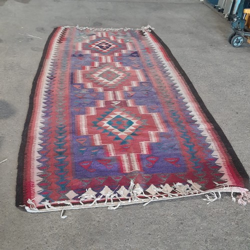 2173 - 1 x patterned rug approx 325 x 165cm