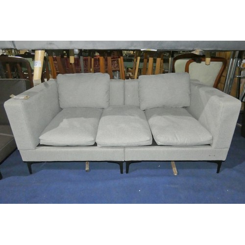 438 - A light upholstered two part sofa approx 165cm wide. Please note this sofa has three seat cushions a... 