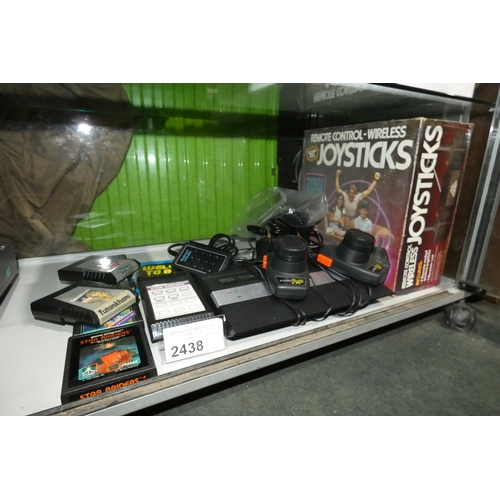 2438 - An Atari 2600 game console with wireless joysticks, Star Raiders game, pad and 5 other games - trade