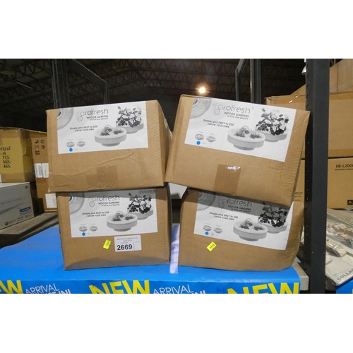 2669 - 4 boxes containing gro fresh indoor gardens