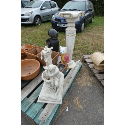 2377 - A quantity of various garden ornaments, Rupert Bear, a wooden pedestal, a resin statue