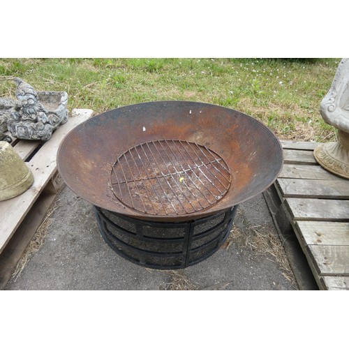 2387 - A large used fire pit