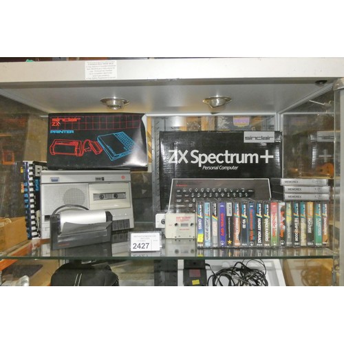 2427 - A vintage ZX spectrum+ computer by Sinclair with box, games, data player, ZX printer etc, contents o... 