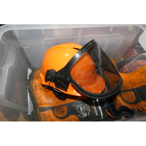 2037 - 1 x Husqvarna 136 petrol engine chainsaw, a quantity of various chainsaw clothing (boots, helmet, tr... 