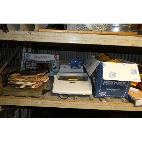 2194 - A quantity of various items including a Brother electric type writer 240v, a spice rack, ornaments, ... 