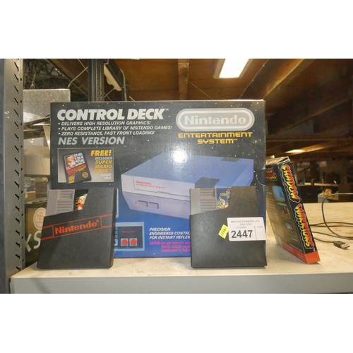 2447 - A vintage Nintendo entertainment system NES Version boxed with super Mario Bros, Double Dragon and S... 