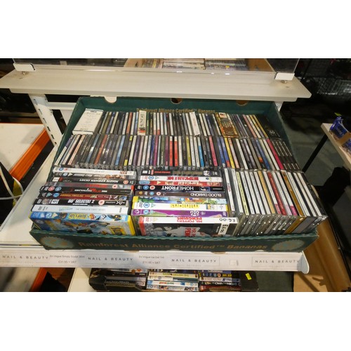 2417 - 7 boxes containing a quantity of various DVDs and CDs, contents of 6 shelves