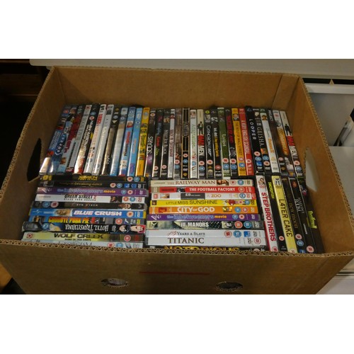 2417 - 7 boxes containing a quantity of various DVDs and CDs, contents of 6 shelves