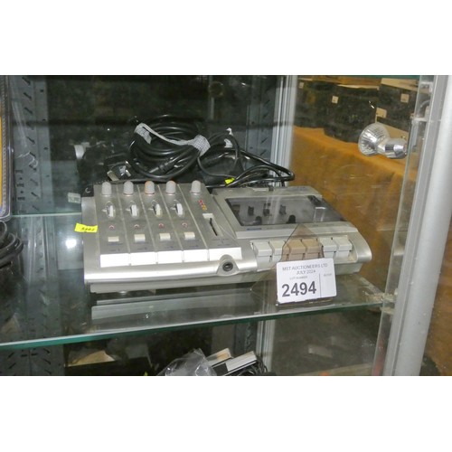 2494 - A 4 track recording studio cassette system by Tascam, type Portastudio MF-P01 with adapter - trade