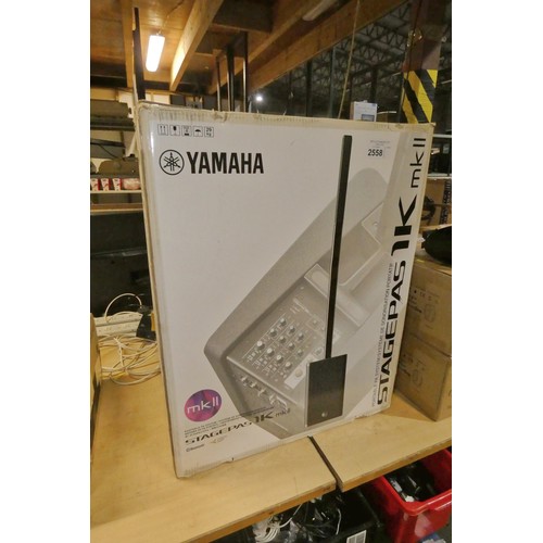 2558 - An unused portable PA system by Yamaha type Stagepas 1K mkII, box is open but unit has not been remo... 