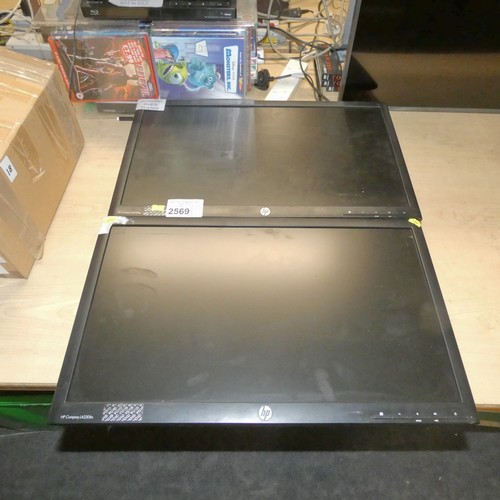 2569 - 2 x 23 inch pc monitors by HP type Compaq LA2306x no stands - trade. Both Tested Working