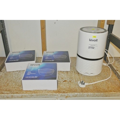 2702 - An unboxed LVH132 air purifier by Levoit and 3 filters trade