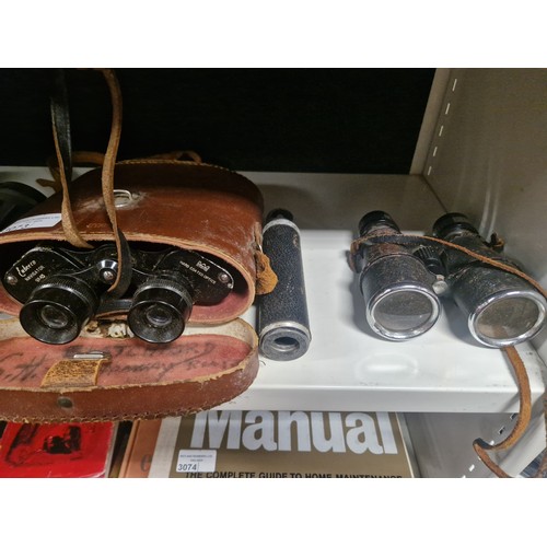 3073 - Three pairs of vintage binoculars and a small telescope including a set of Swift Osprey 7.5 x 42 bin... 