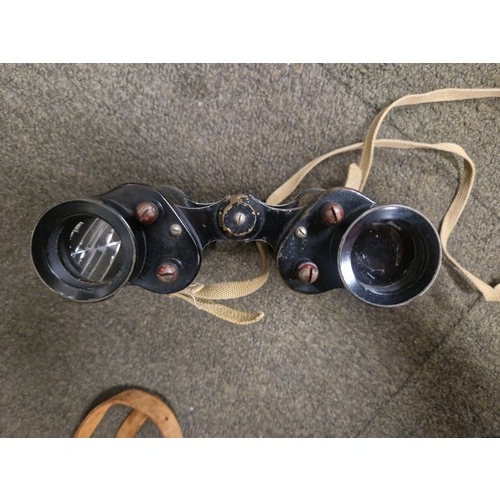 3023 - A vintage Polaroid camera, a set of Wray 6E/293 binoculars marked AM 1944 with original matching num... 