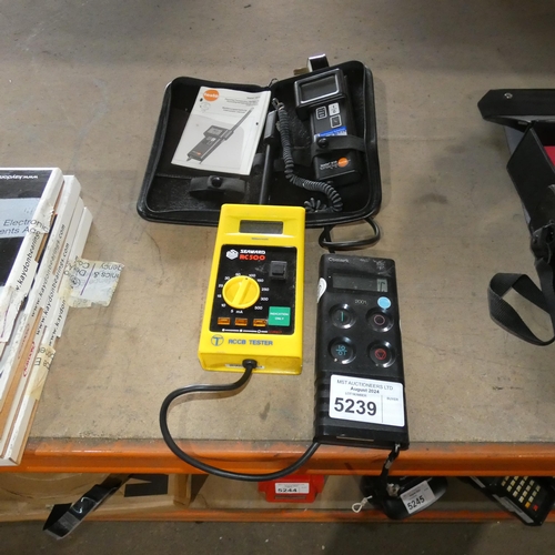 5239 - 1 x Seaward RCCB tester, 1 x Comark thermometer and 1 x Testo 610 humidity / temperature instrument