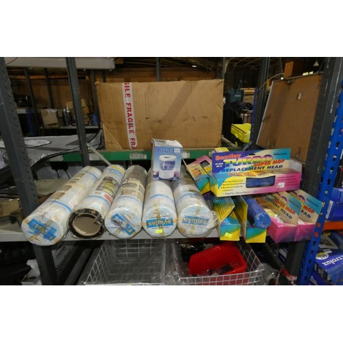 5817 - A quantity of various items including rolls of Sylglas tile adhesive, metal baskets, wine dispensers... 