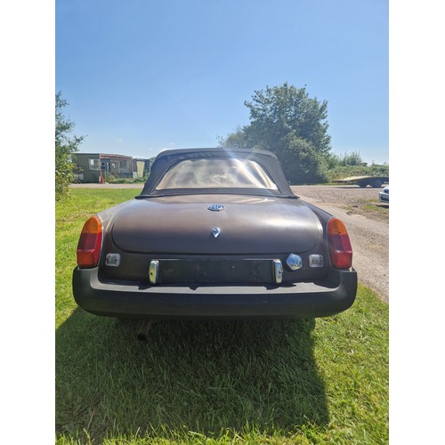 15 - MGB Sports Roadster, brown with dark Mohair soft top, Reg UUH 265S, 1st registered 20/03/1978, 4 spe... 