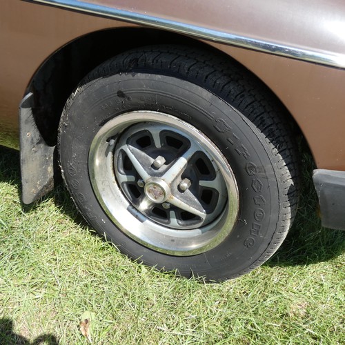 15 - MGB Sports Roadster, brown with dark Mohair soft top, Reg UUH 265S, 1st registered 20/03/1978, 4 spe... 