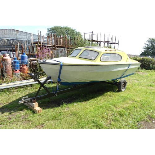 6241 - A cabin cruiser boat with a Mariner 25hp two stroke electric start outboard engine. This boat is app... 