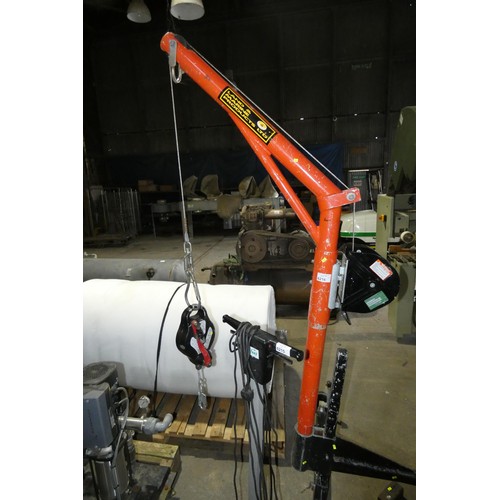 6216 - A large red / black metal wheeled man lifting frame by Land and Marine Products Ltd with a UCL Safet... 