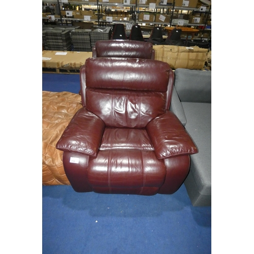 299 - 2 x deep burgundy leather upholstered electric reclining armchairs. Please note that the mains plugs... 