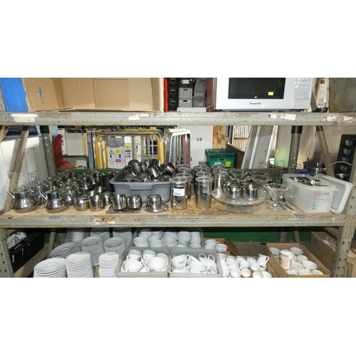 1052 - A large quantity of various stainless steel catering type items, teapots, milk jugs, sugar bowls etc... 