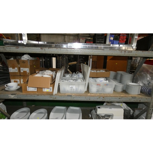 1065 - A quantity of various white crockery, cups and saucers, cups branded Patisserie Valerie