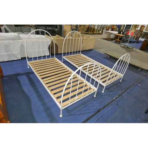 293 - 2 x white metal single bed frames both 3ft. Please note that no mattresses are included and these be... 