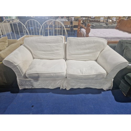 296 - 1 x light coloured sofa approx 215cm wide. Please note that this sofa is used