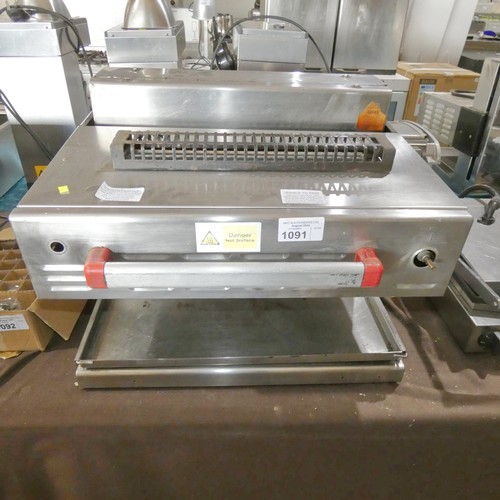 1091 - A commercial stainless steel gas fired rise and fall salamander grill, no make or model visible - tr... 