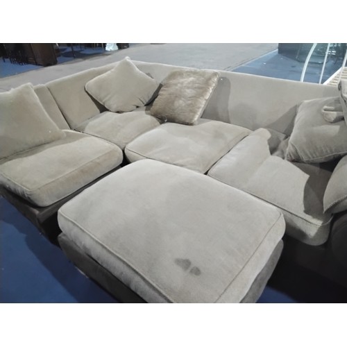 295 - A two tone brown upholstered three part corner sofa with matching foot stool approx 270 x 170cm. Ple... 