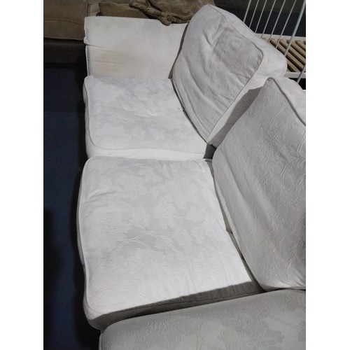 296 - 1 x light coloured sofa approx 215cm wide. Please note that this sofa is used