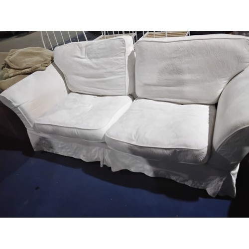 296 - 1 x light coloured sofa approx 215cm wide. Please note that this sofa is used