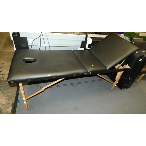 2186 - 1 x black upholstered folding massage bench - Please note that there are several small splits in the... 