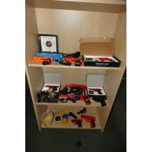 2254 - A quantity of various Air Soft BB guns, a target and an Armex Black Shadow catapult. Contents of 3 s... 