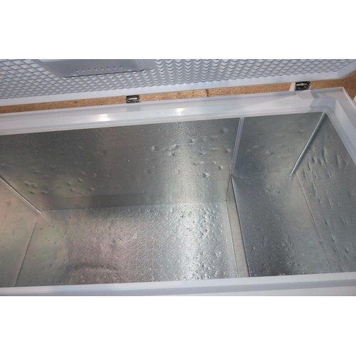 1015 - A large chest freezer by Husky no model visible, approx 154x71cm - trade  Tested Working