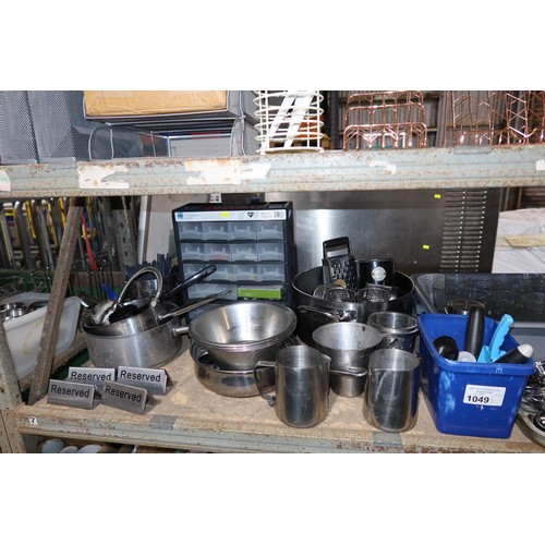 1049 - A quantity of various catering related items including wicker trays, stainless steel bowls, jugs, ti... 