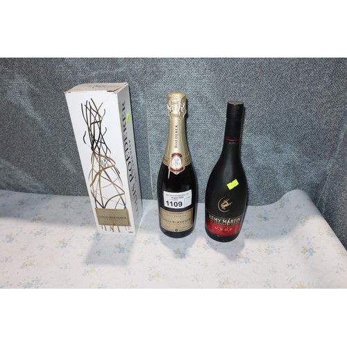 1109 - A bottle of Louis Roederer Champagne & a bottle of Remi Martin Champagne