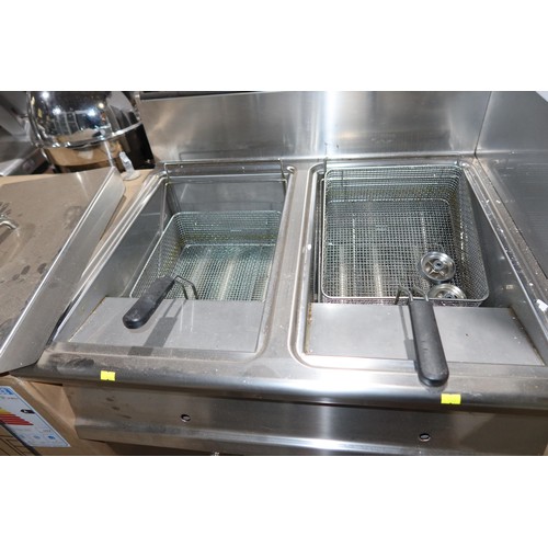 1111 - An industrial/commercial stainless steel gas fired twin basket deep fryer by Lotus, barely used - tr... 