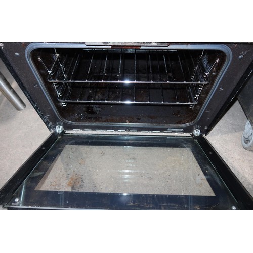 1114 - An integrated 2 door oven by Belling type BELBI70F - trade