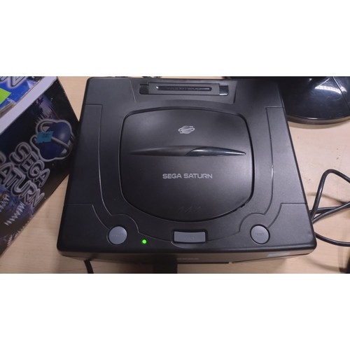 2589 - A Sega Saturn video game console with box, 2 controllers and 19 boxed games including Highway 2000, ... 