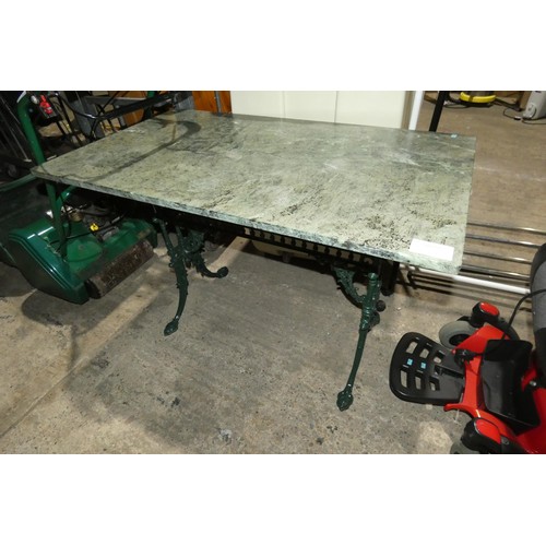 2054A - 1 x garden table approx 107 x 61cm with green painted cast metal base