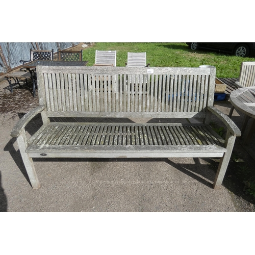 2663 - A large 3 person wooden bench