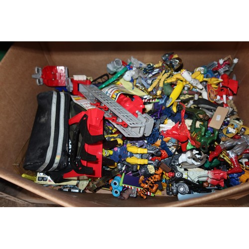 2102 - A quantity of various Transformer related items including toys, DVDs and a 3D 100 piece stand up puz... 