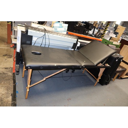 2187 - 1 x black upholstered folding massage bench - Please note that there is a small split on one corner