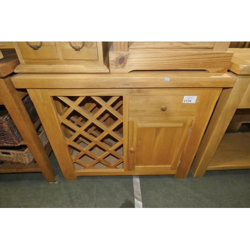 2134 - 1 x Oak cabinet with 1 door, 1 drawer and a bottle rack below approx 100cm wide