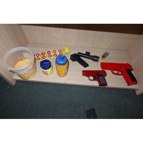 2254 - A quantity of various Air Soft BB guns, a target and an Armex Black Shadow catapult. Contents of 3 s... 