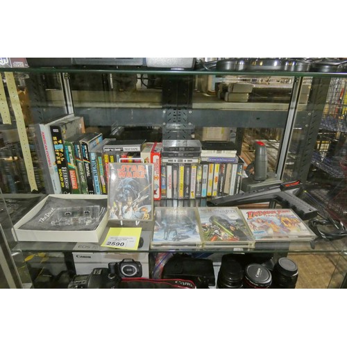 2590 - A quantity of Sinclair Spectrum games and accessories approx 40 games including, Star Wars, Empire S... 