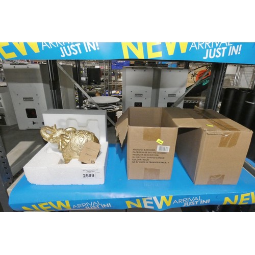 2599 - 2 large gold elephant candles